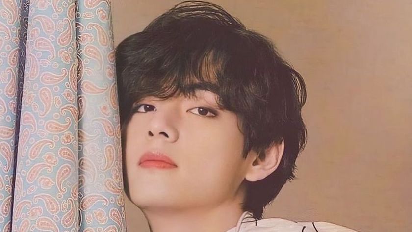 BTS's V (Kim Taehyung) turns heads at the airport with his