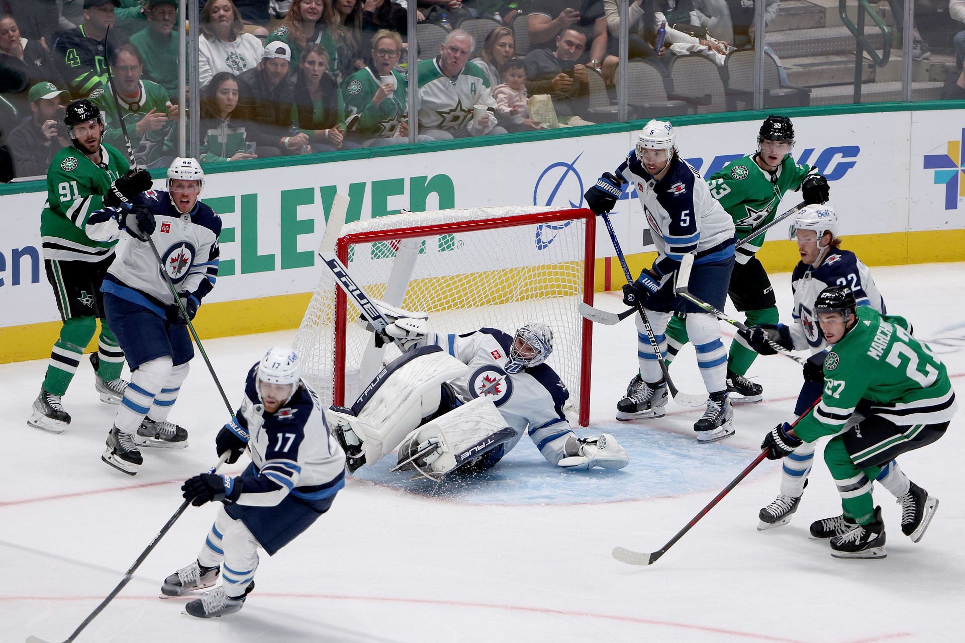 The NHL shield and or logo is seen on the back of a goal net before an NHL  hockey game between the Winnipeg Jets and the Dallas Stars on Friday, Feb.  11