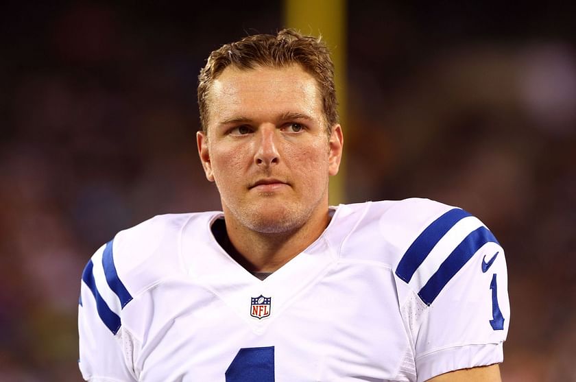 Indianapolis Colts punter Pat McAfee (1) talks to Jeff Saturday