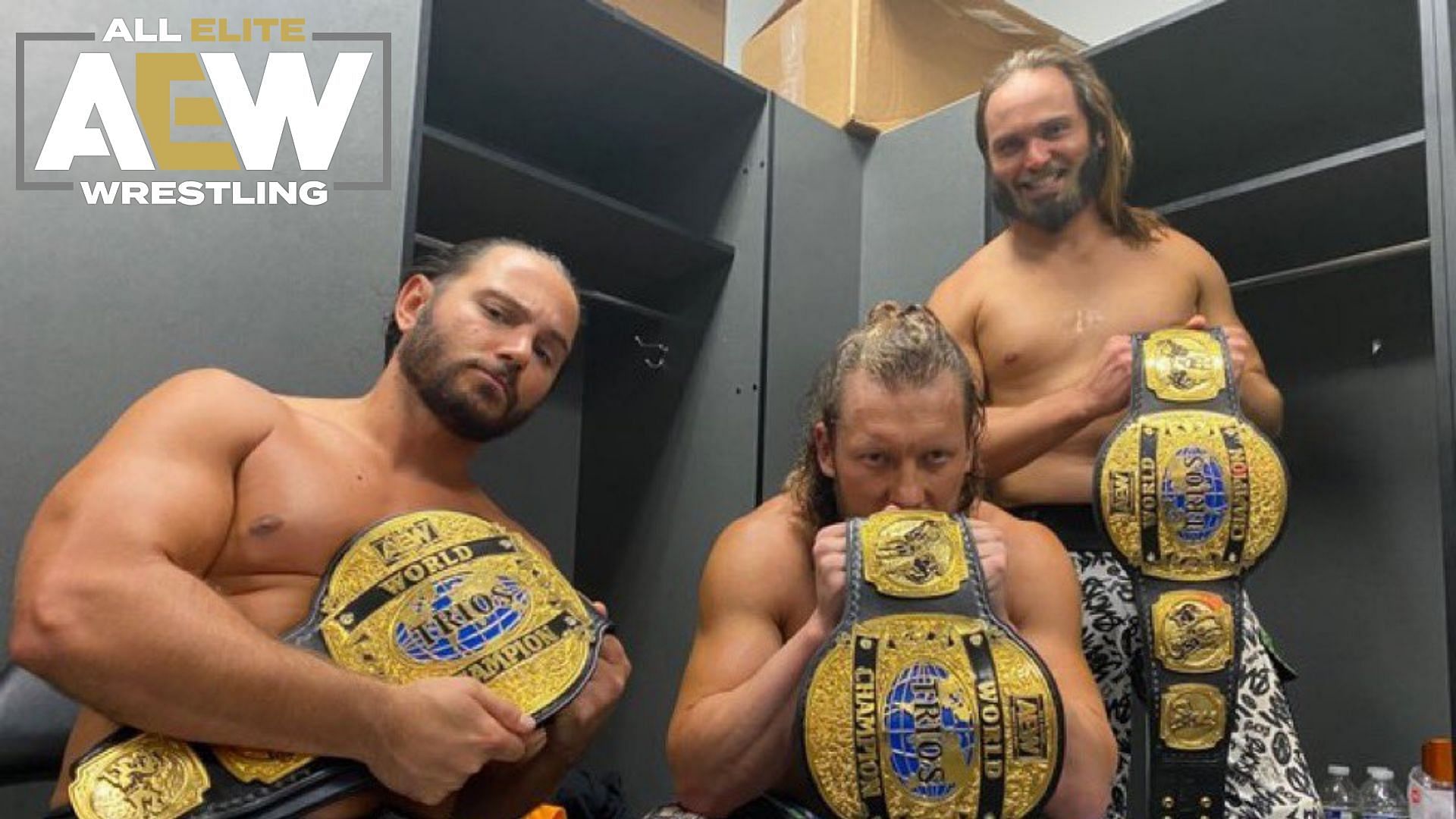 The Elite backstage with the AEW Trios Championships