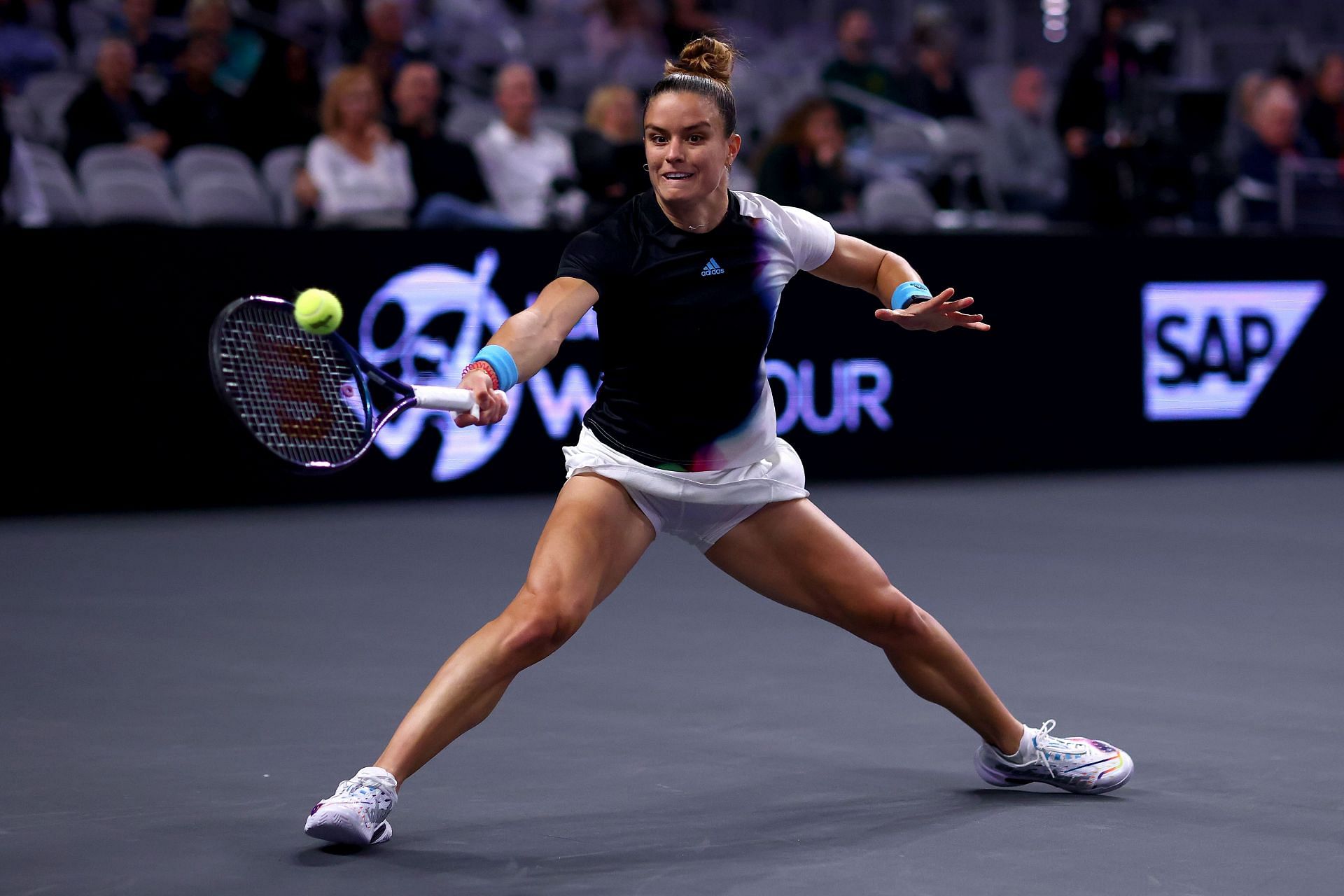 Maria Sakkari in action against Ons Jabeur at the 2022 WTA Finals.