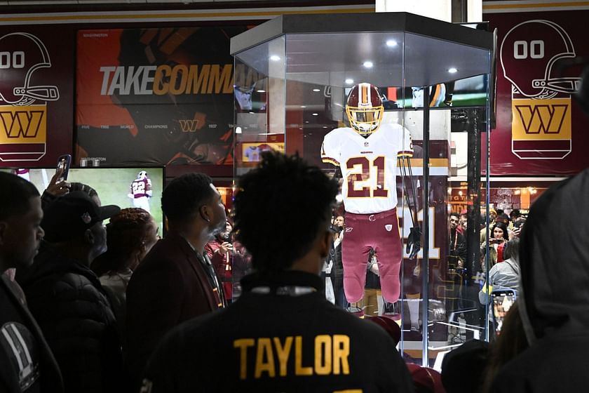 Members of the late Sean Taylor's family gather on the field as