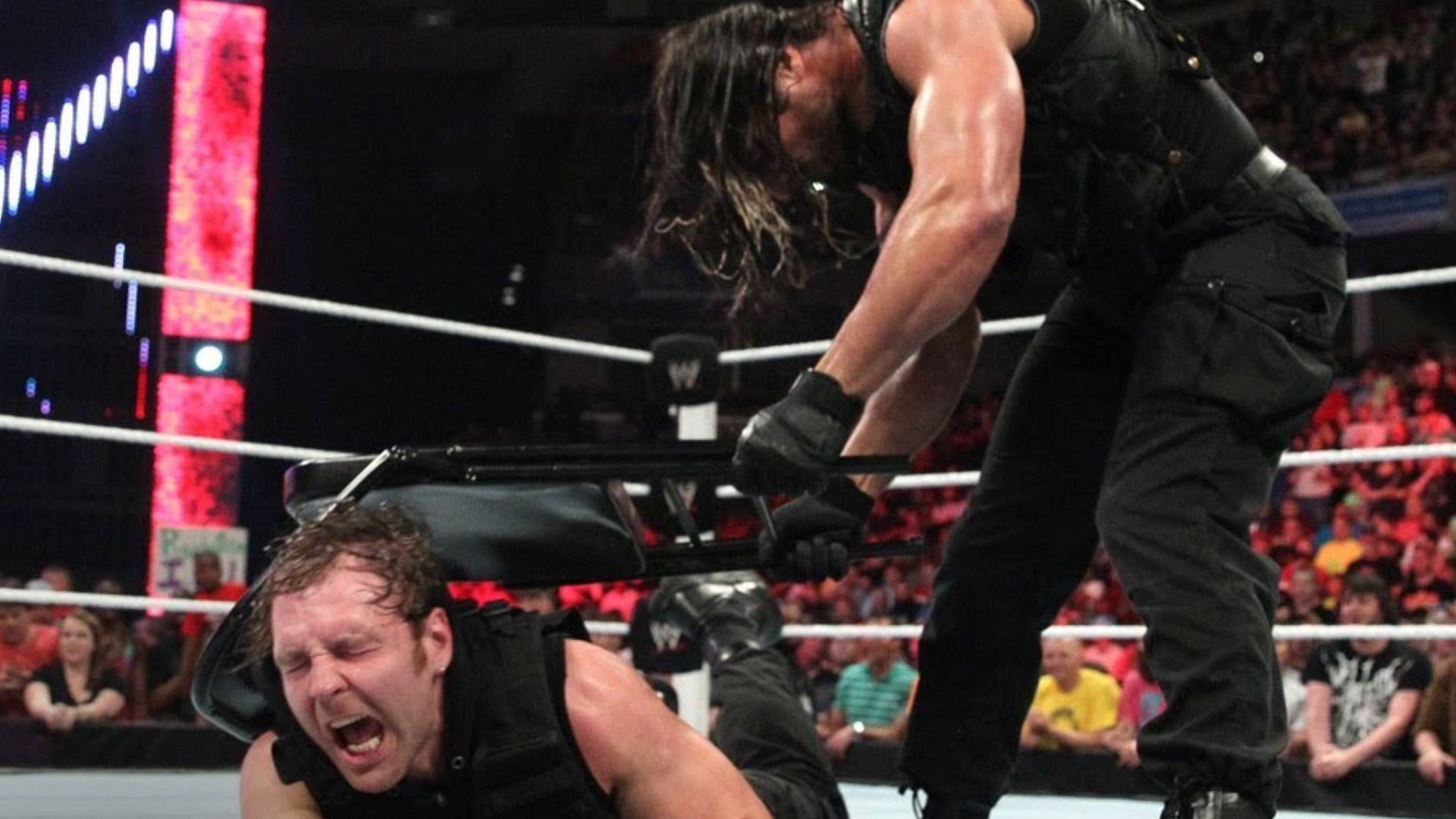 Seth Rollins attacks Dean Ambrose with a steel chair. WWE RAW (June 2, 2014)