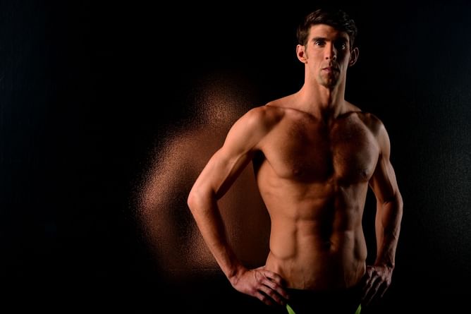 Why did Michael Phelps start swimming?