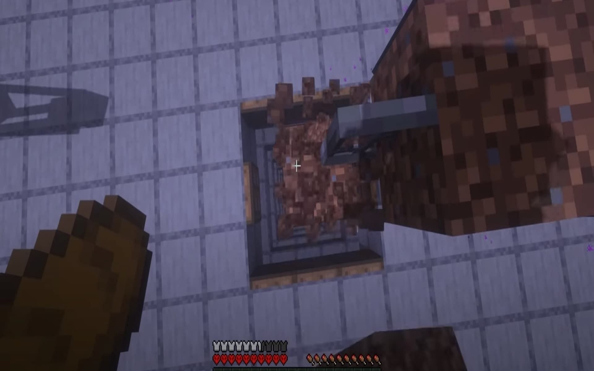 Place an iron bar on top of the three dirt blocks (Image via YouTube/Moretingz)