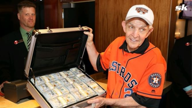 WATCH: Astros superfan Mattress Mack carrying $10 mil. in winnings from Bet MGM by wheelbarrow