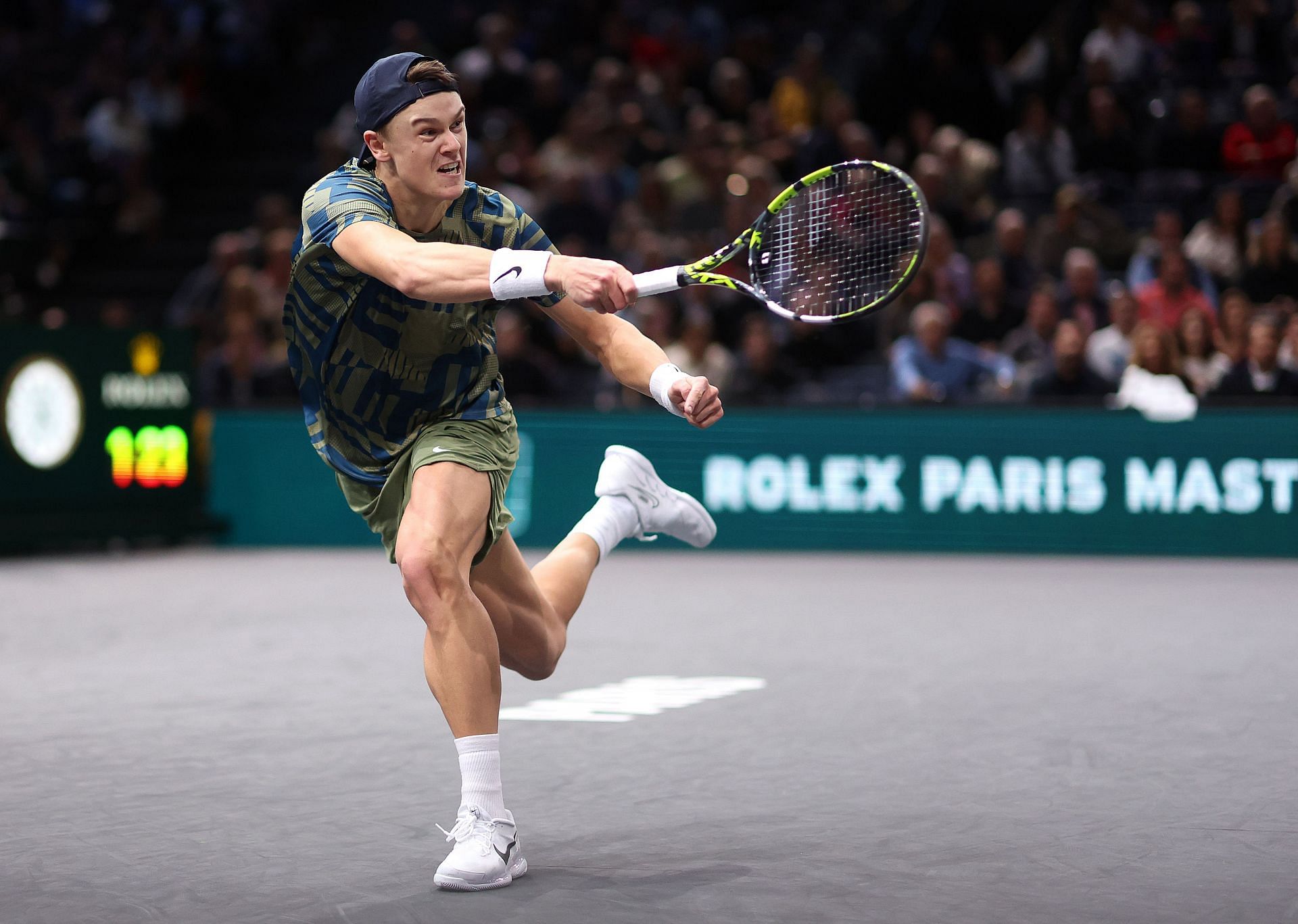 Holger Rune in action at the 2022 Paris Masters