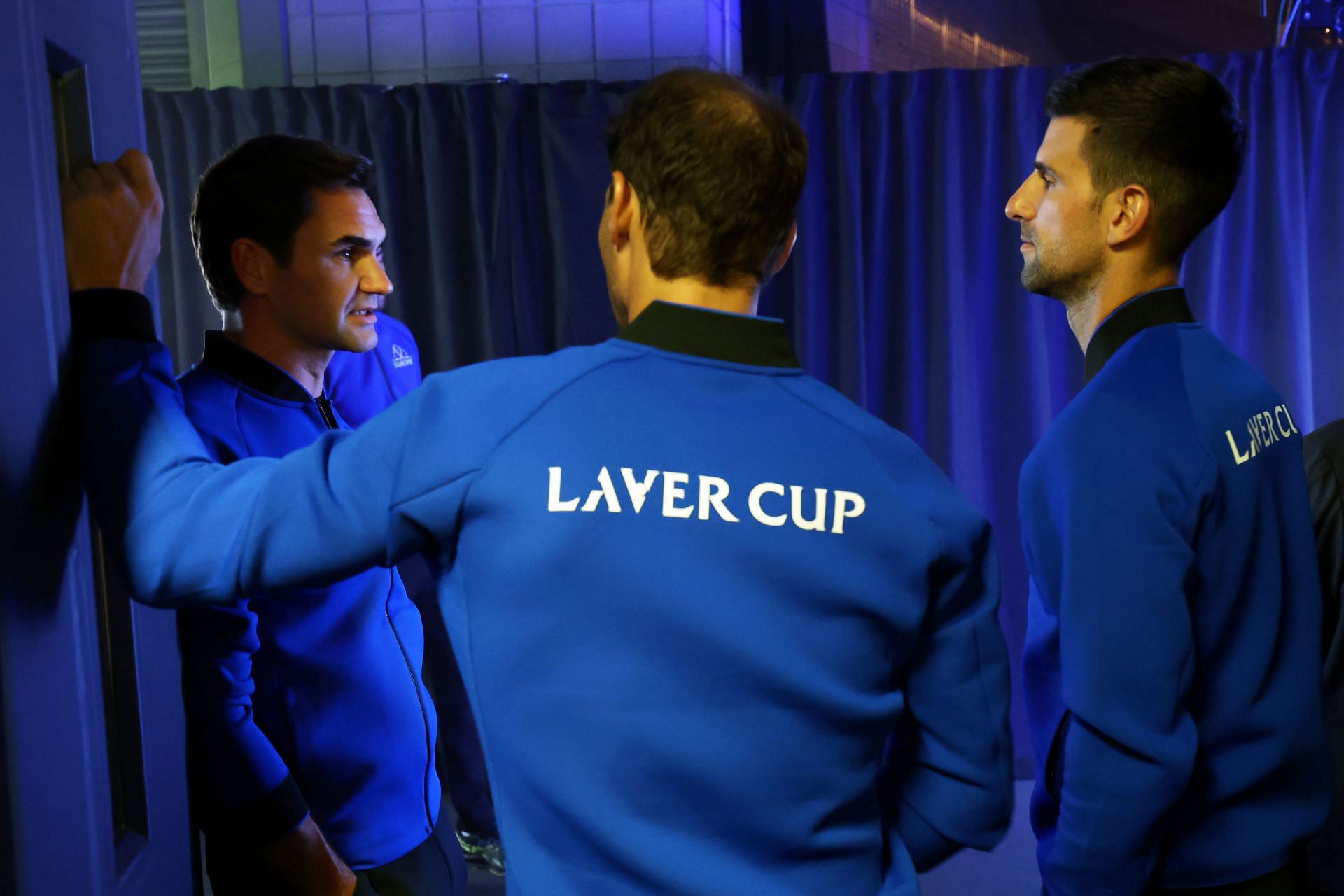 Roger Federer of Team Europe speaks with Rafael Nadal and Novak Djokovic at the Laver Cup 2022