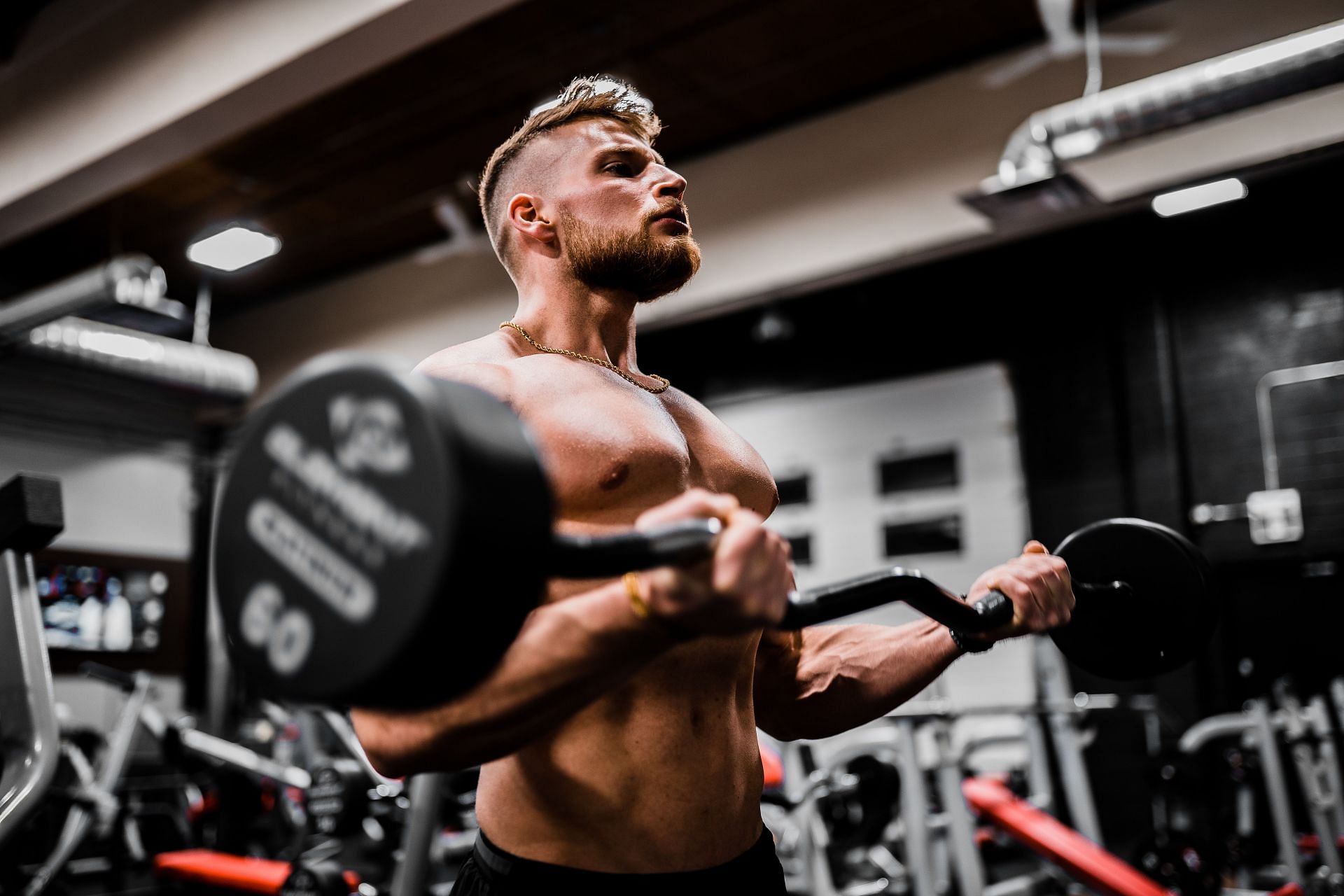 Exercise can help shrink the area to a more proportionate size in men whose breasts may just hold extra fat. (Image via Unsplash/ Anastase Maragos)