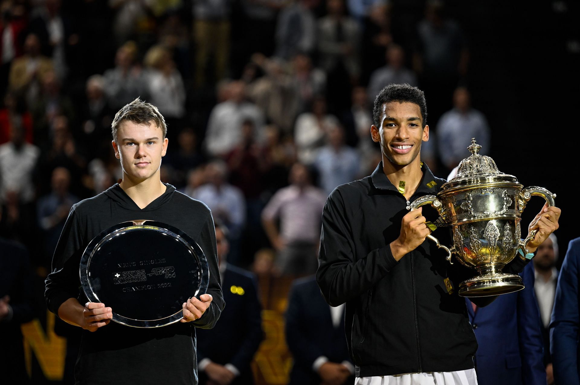 Holger Rune (L) and Felix Auger-Aliassime at the 2022 Swiss Indoors.