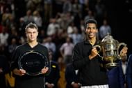 Holger Rune (L) and Felix Auger-Aliassime at the 2022 Swiss Indoors.