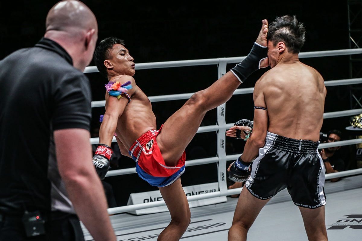 Mongkolpetch Petchyindee plants a front kick on Joseph Lasiri&#039;s head. [Photo ONE Championship]