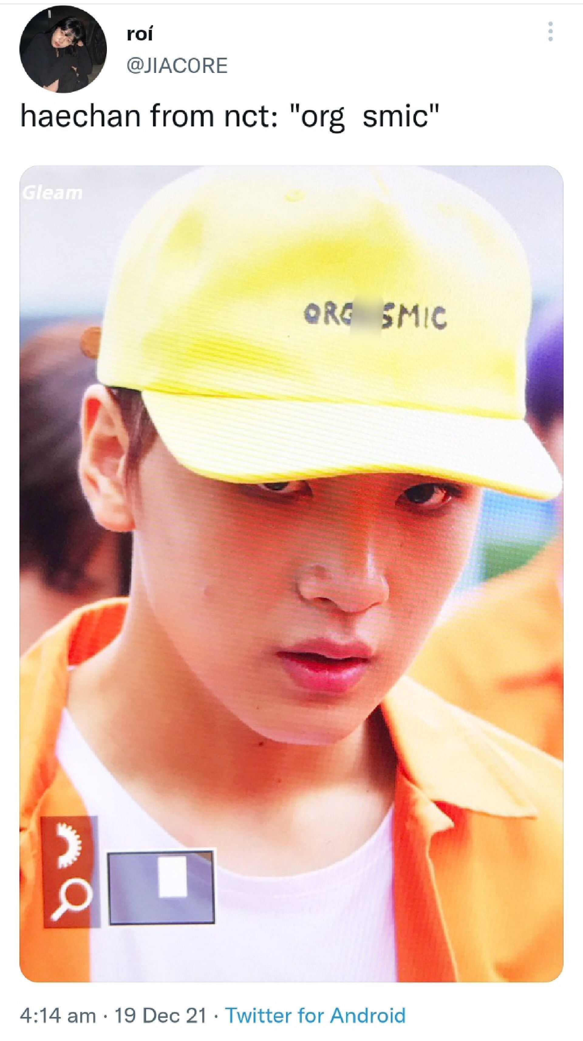 Haechan from NCT wearing a cap that says &quot;org*smic&quot;
