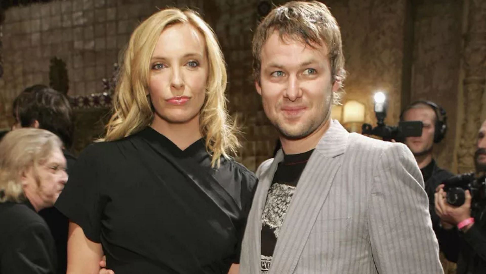 Toni Collette and Dave Galafassi photographed together. (Image via Kristian Dowling/Getty)