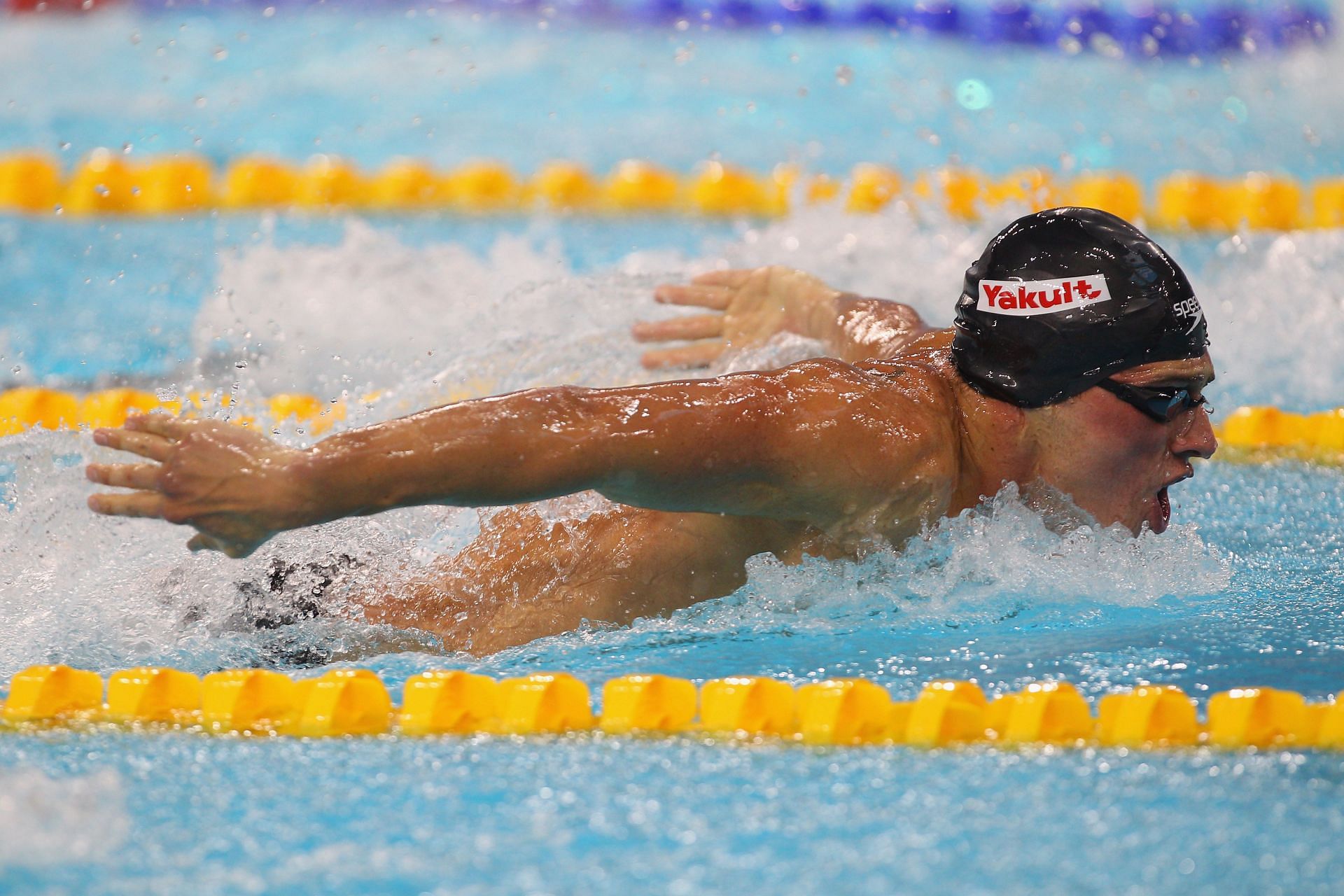 Lochte swims at the 10th FINA World Swimming Championships, 2010 (Photo by Clive Rose/Getty Images)
