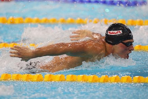 Lochte swims at the 10th FINA World Swimming Championships, 2010 (Photo by Clive Rose/Getty Images)