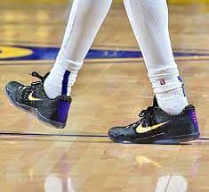 Michigan guard Jordan Poole's Nike's Jordan brand basketball shoes