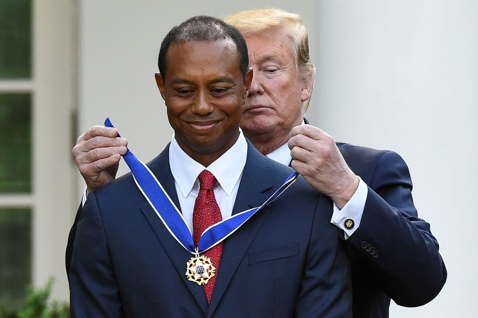 Woods received the Presidential Medal of Freedom from then President Trump in 2019 (Image via Reuters)
