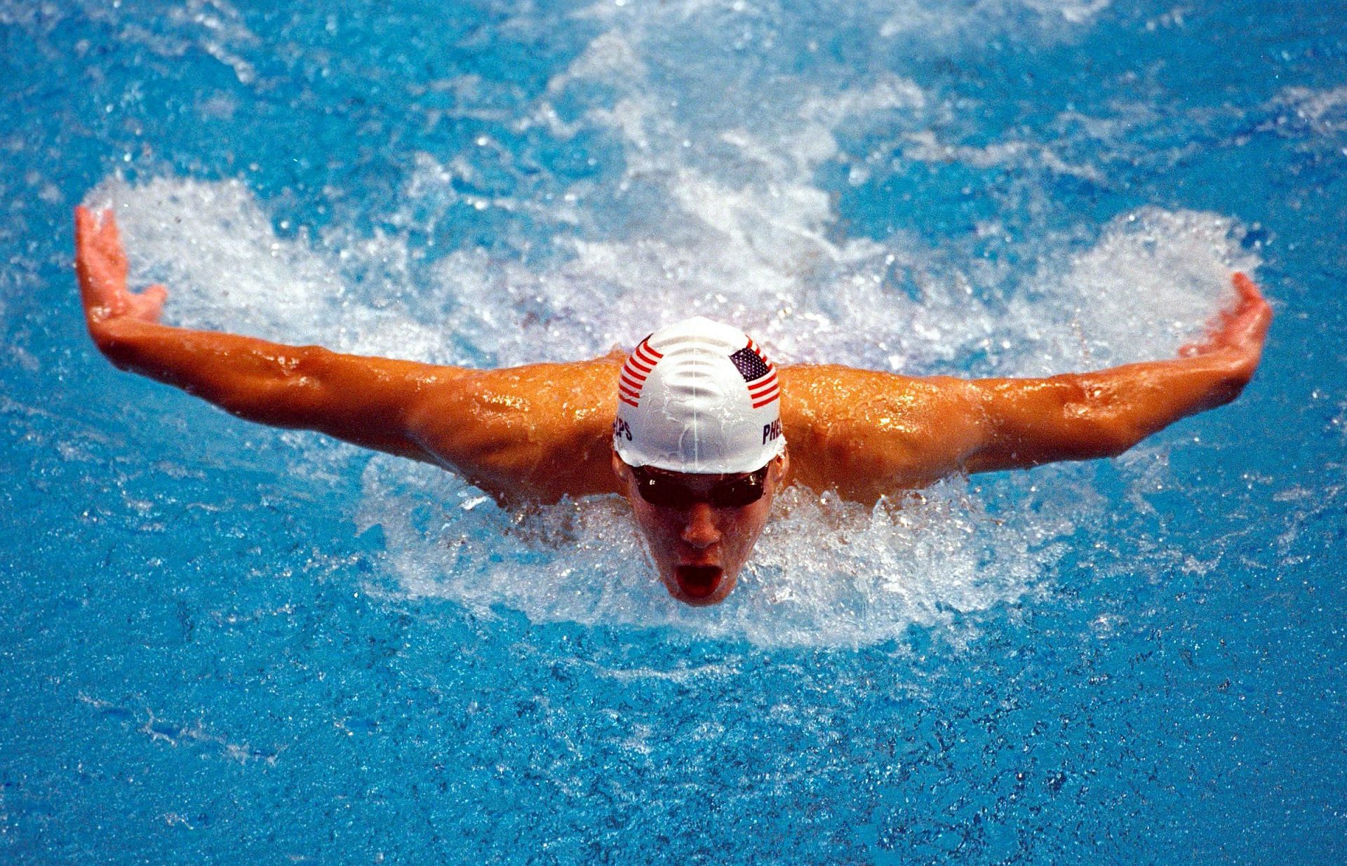 Phelps swims at the 2000 Sydney Olympics (Photo Credit: Getty / Ross Kinnaird /Allsport)