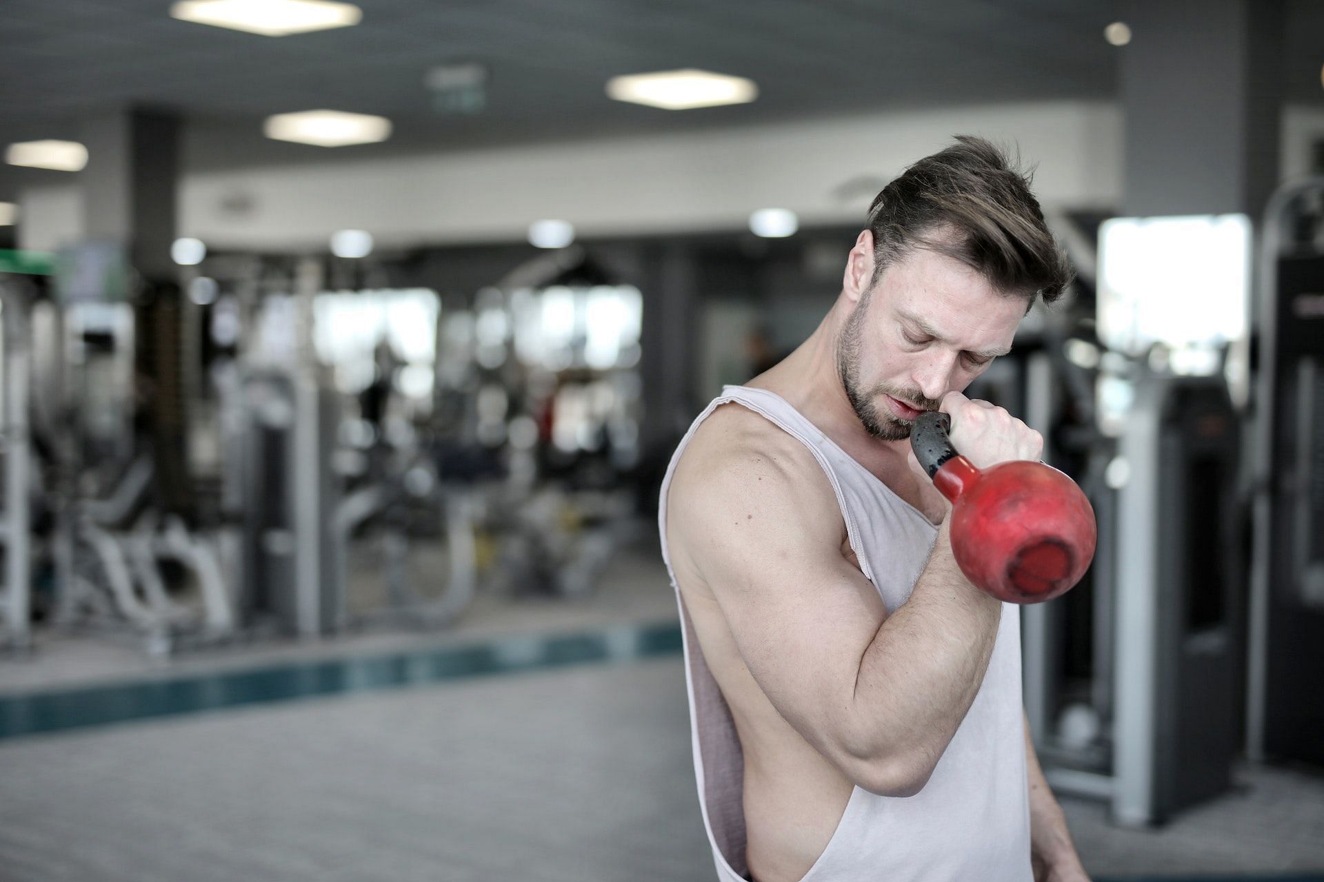 Bent-over rows target the biceps. (Photo via Pexels/Andrea Piacquadio)