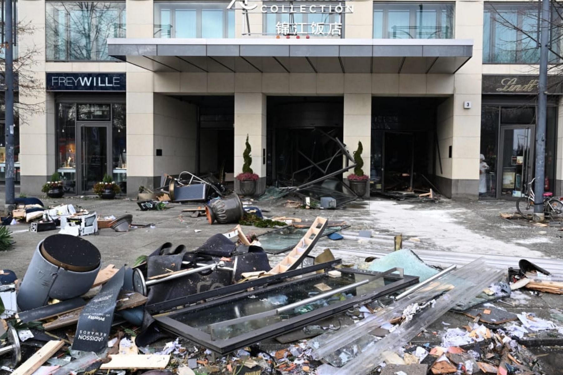 Ruins lying in front of the front gates of Radisson Blu. The front gates are also damaged. (Image via AFP)