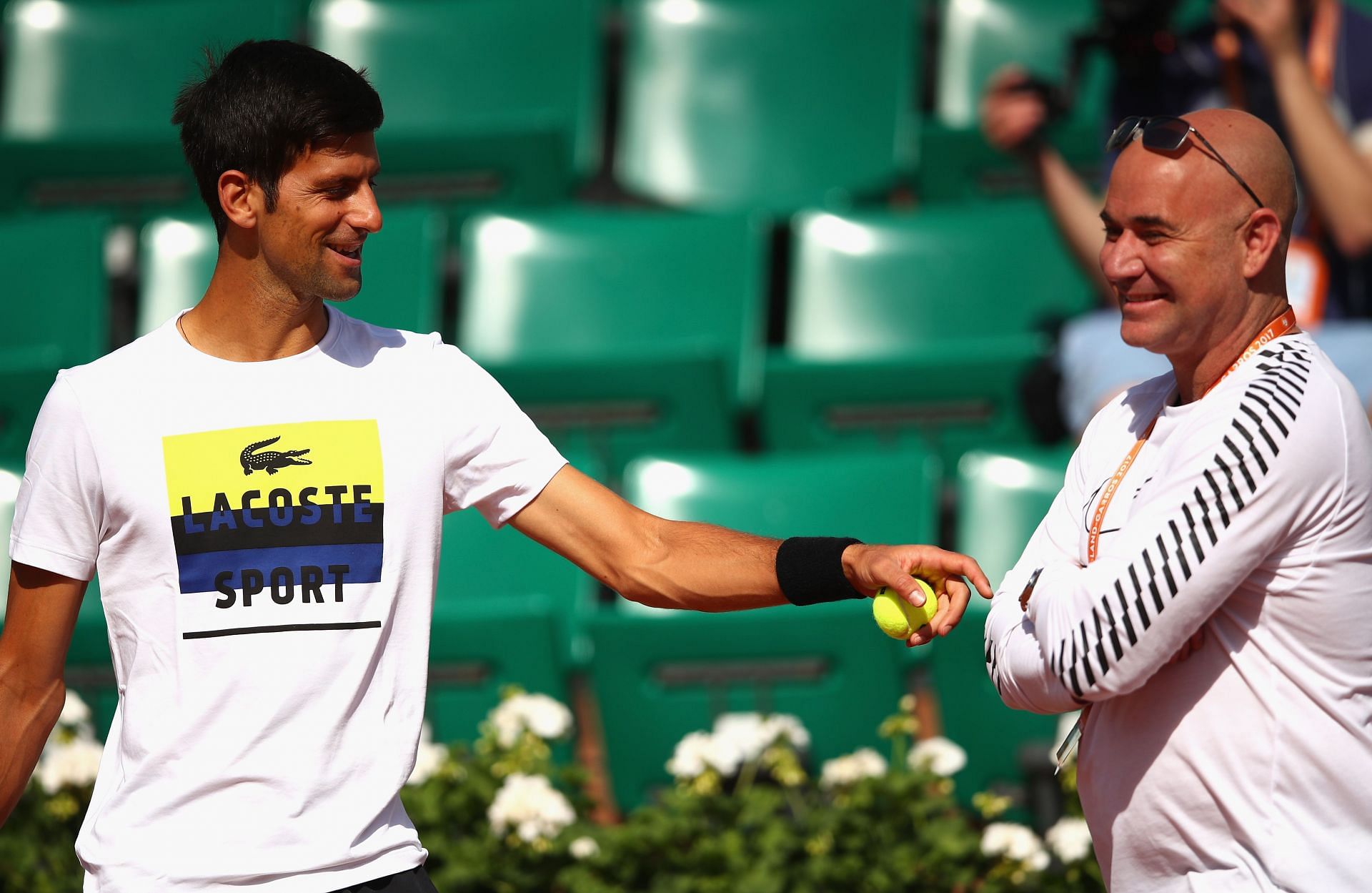 Novak Djokovic and Andre Agassi at the 2017 French Open.