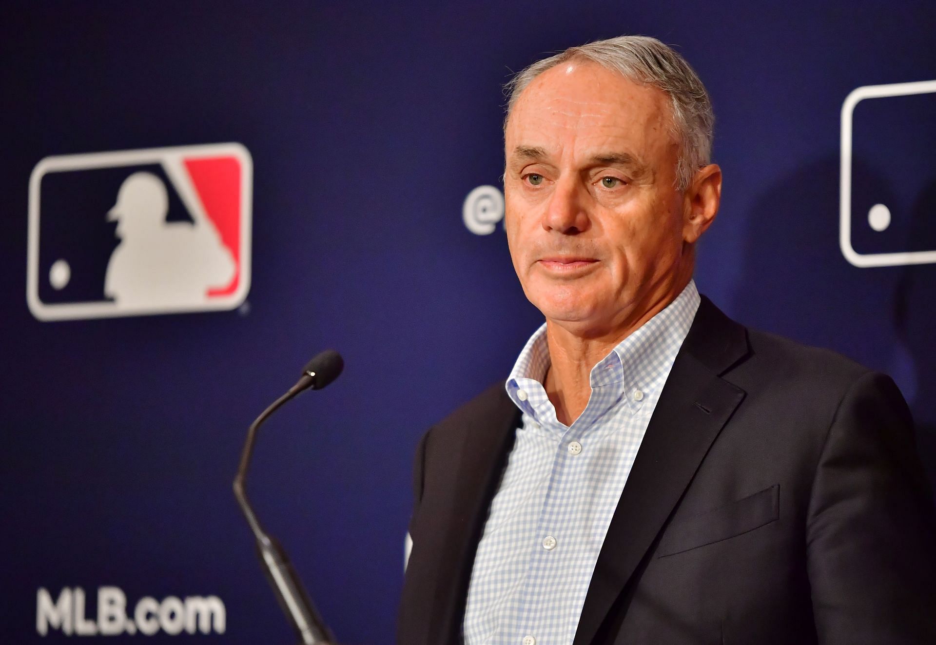 Major League Baseball Commissioner Rob Manfred answers questions during an MLB owner&#039;s meeting at the Waldorf Astoria on Feb. 10 in Orlando, Florida. Manfred addressed the ongoing lockout of players, which owners put in place after the league&#039;s collective bargaining agreement ended on De. 1, 2021.