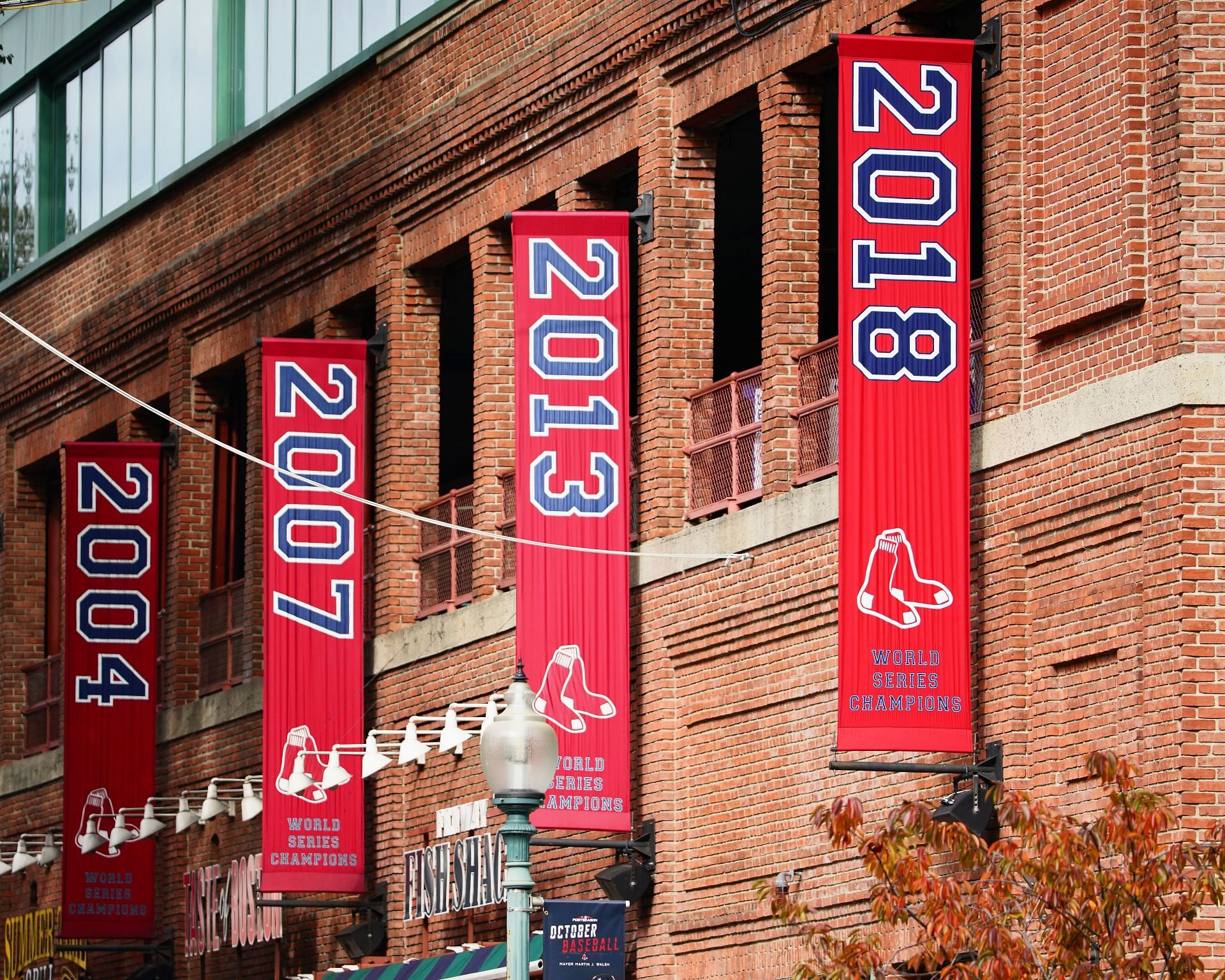 The Boston Red Sox 2018 World Series Championship banner hangs outside Fenway Park