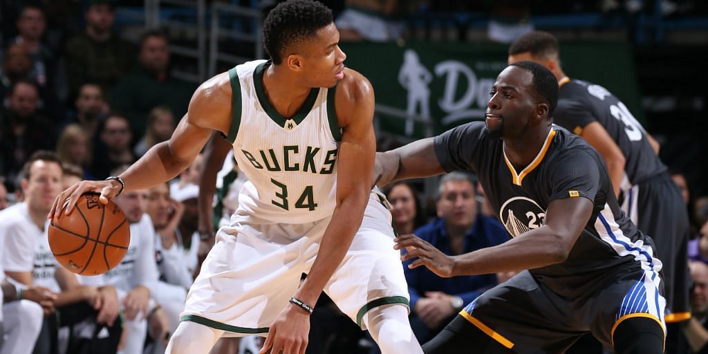 Giannis Antetokounmpo and Draymond Green in action [Photo source: Slam]