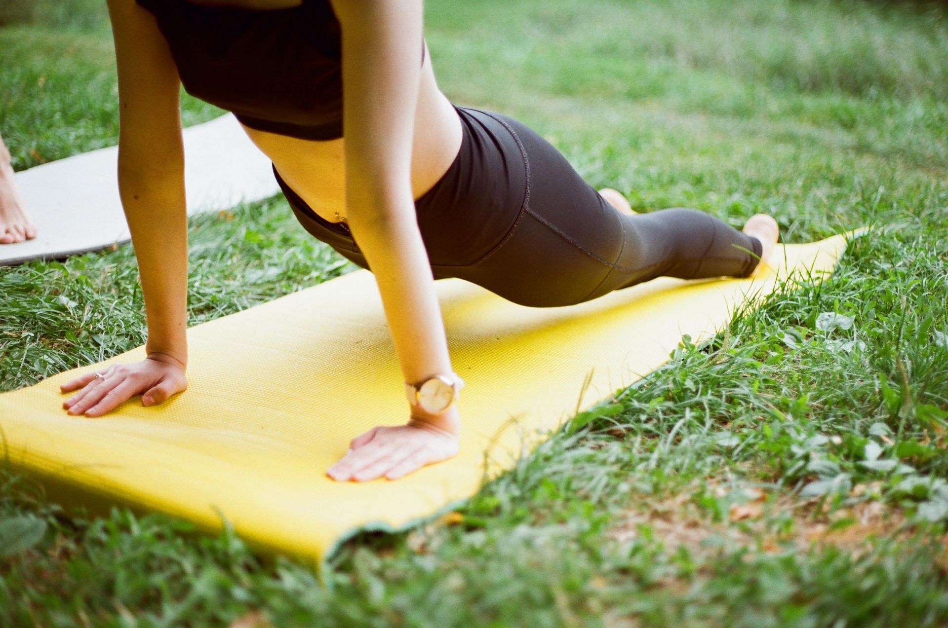 Yoga mats make your practice more stable and secure. (Image via Unsplash/ Hopefilmphoto)