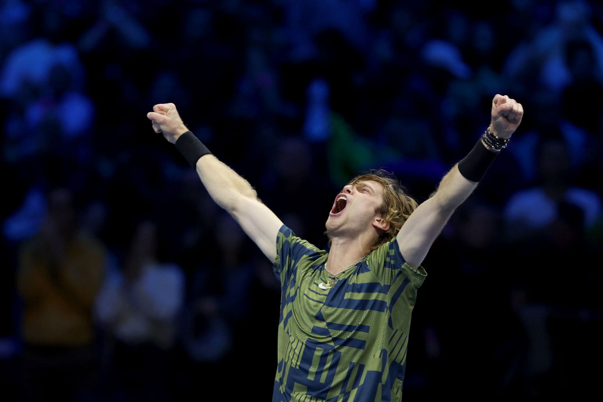 Andrey Rublev celebrates his win against Stefanos Tsitsipas at the 2022 Nitto ATP Finals.