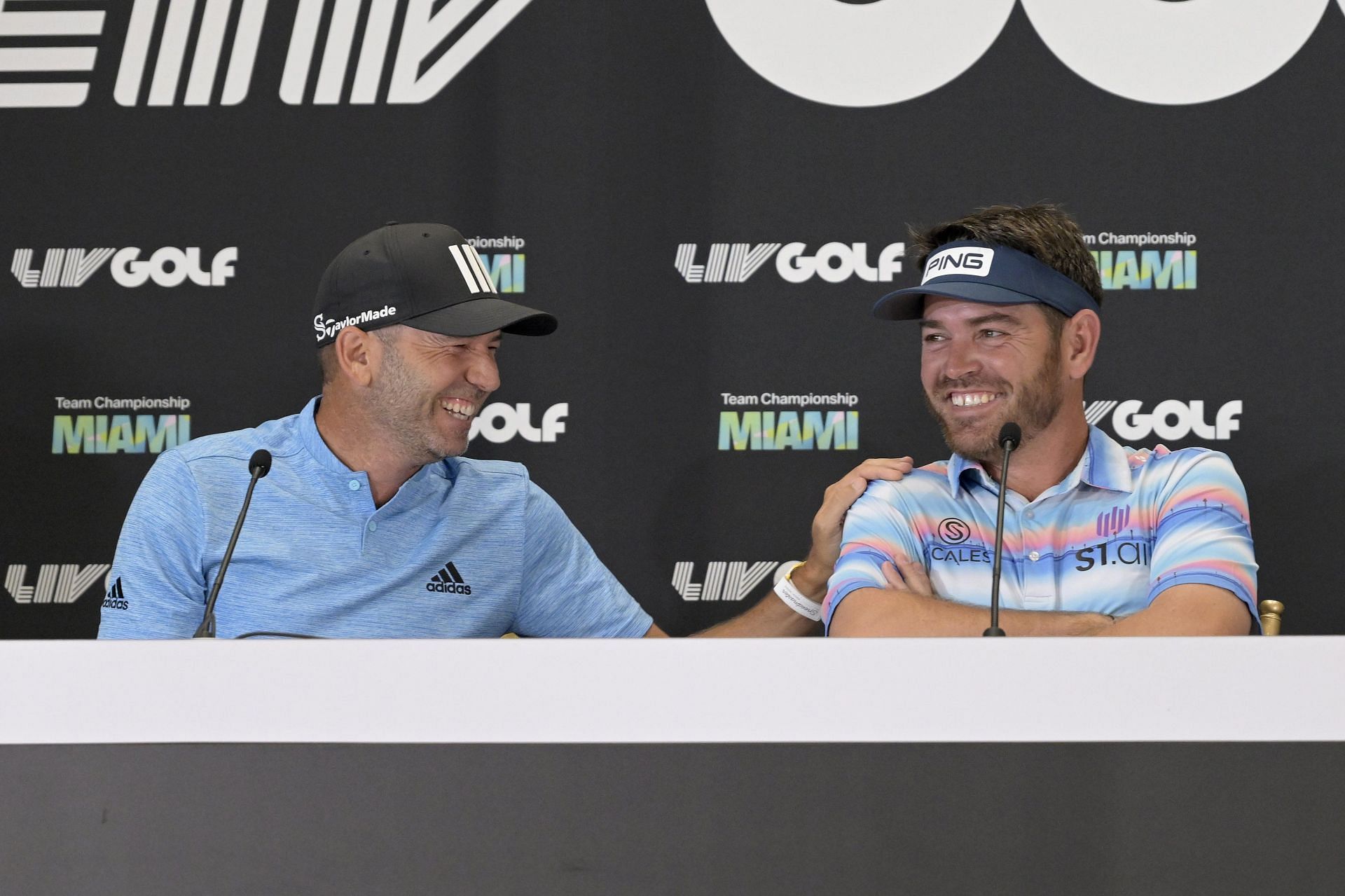 Sergio Garcia and  Louis Oosthuizen share a laugh during LIV Golf