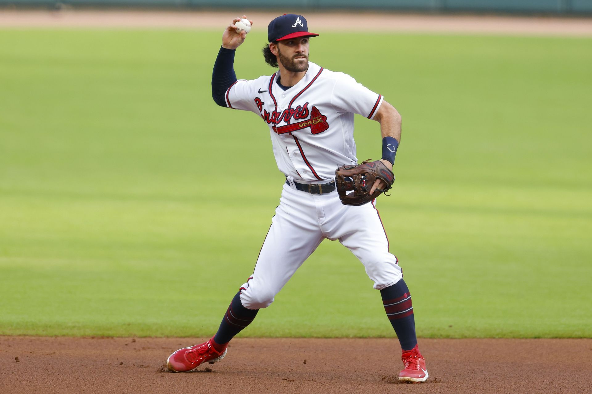 Dansby Swanson throws to first during the first inning against the New York Mets at Truist Park.