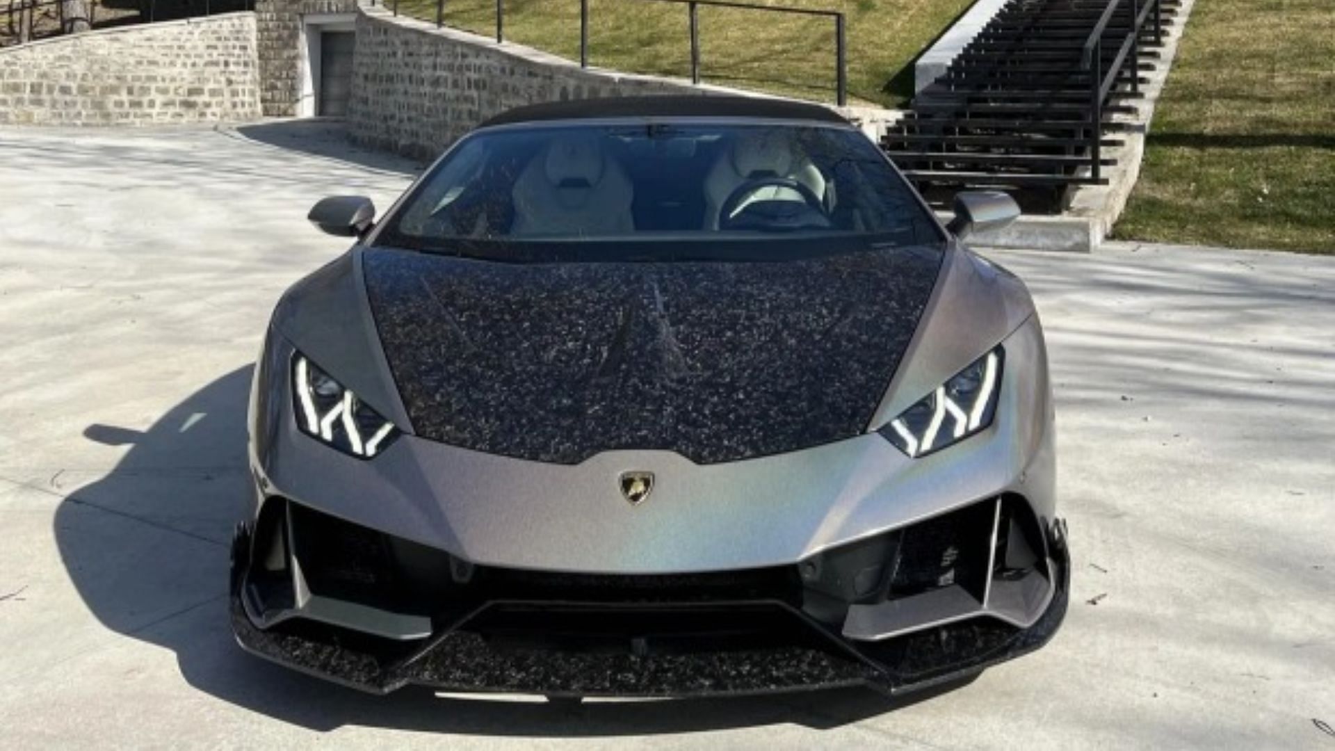 Tate&#039;s black and silver Lamborghini Huracan Spyder, worth $225K (Image via Instagram)