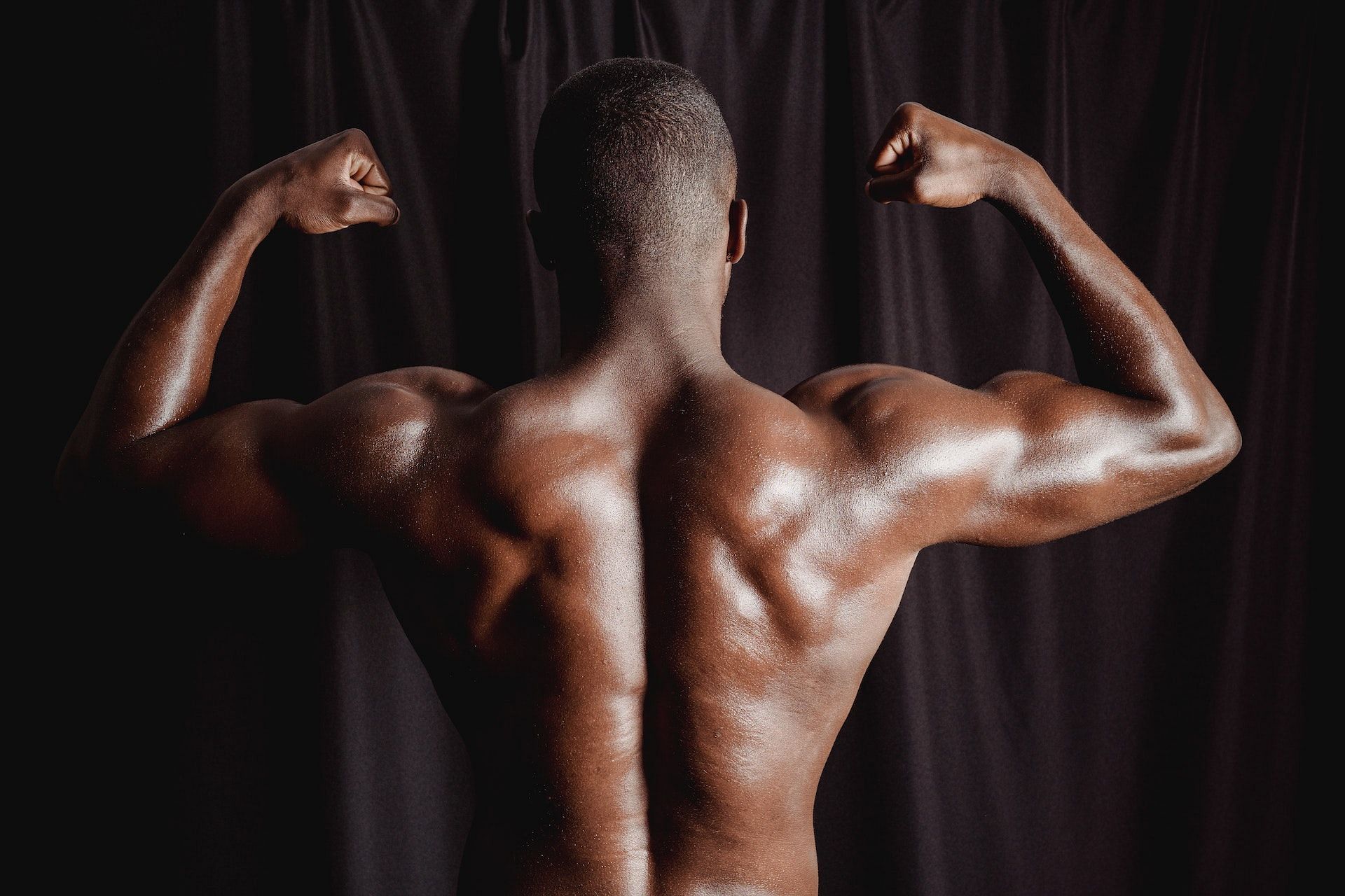 The front raise helps define upper body muscles. (Photo via Pexels/Mike Jones)