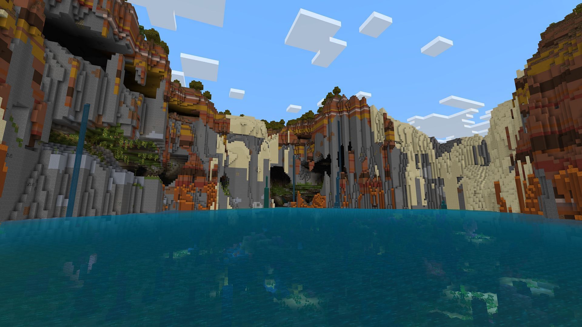 This gorgeous natural crater is found right next to this seed&#039;s spawn (Image via Mojang)