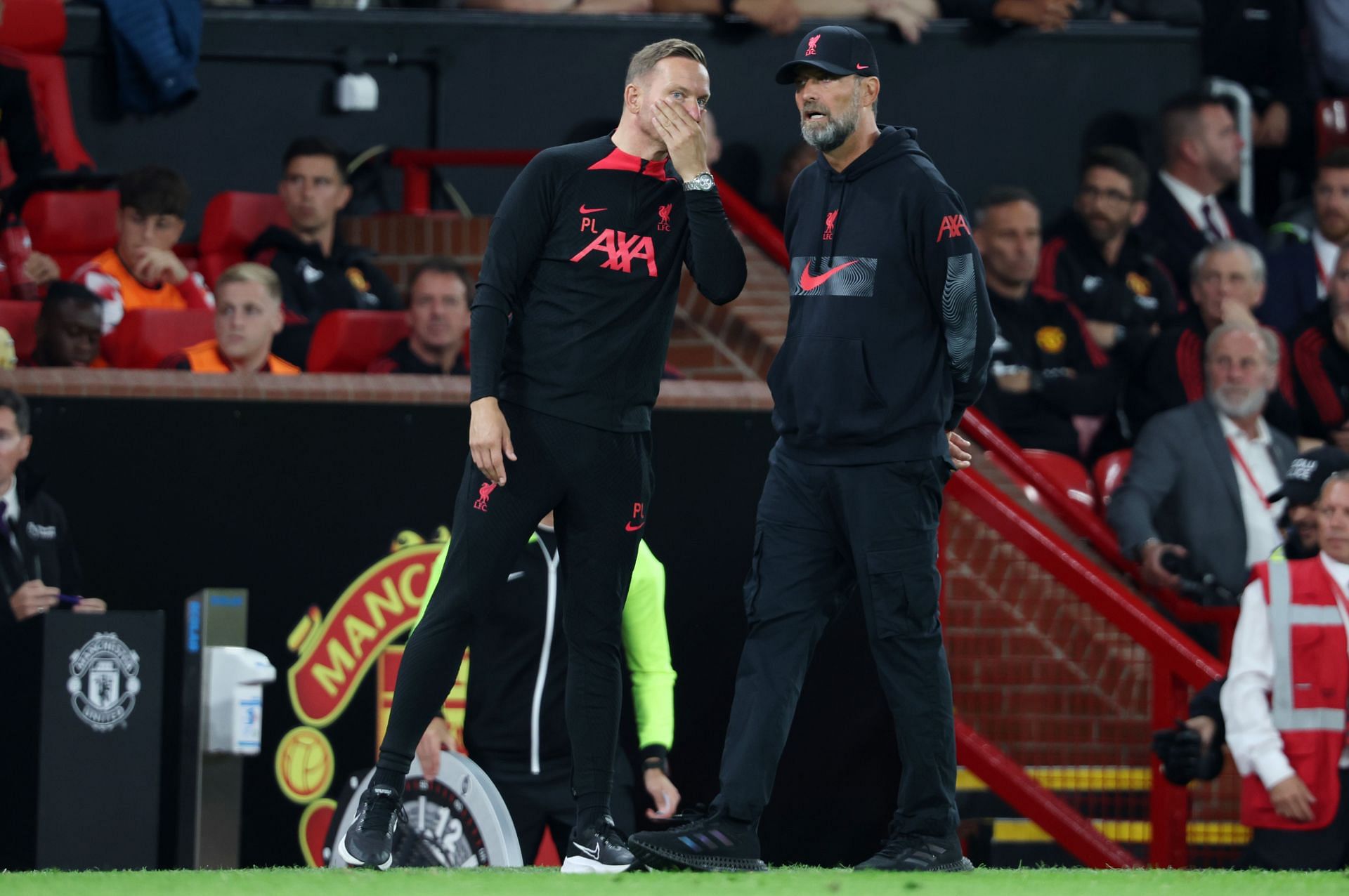 Manchester United v Liverpool FC - Premier League: Jurgen Klopp and Pep Lijnders