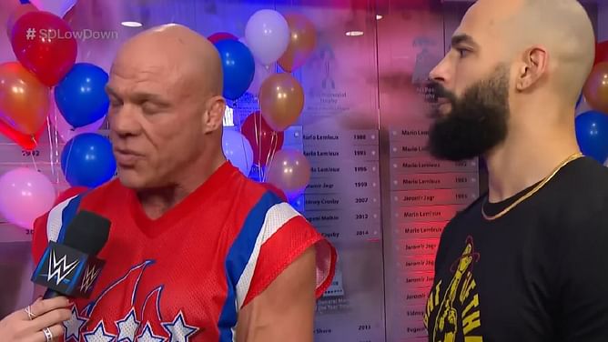 Female WWE personality asks "Why they bald?" in response to Kurt Angle and Ricochet's backstage photo