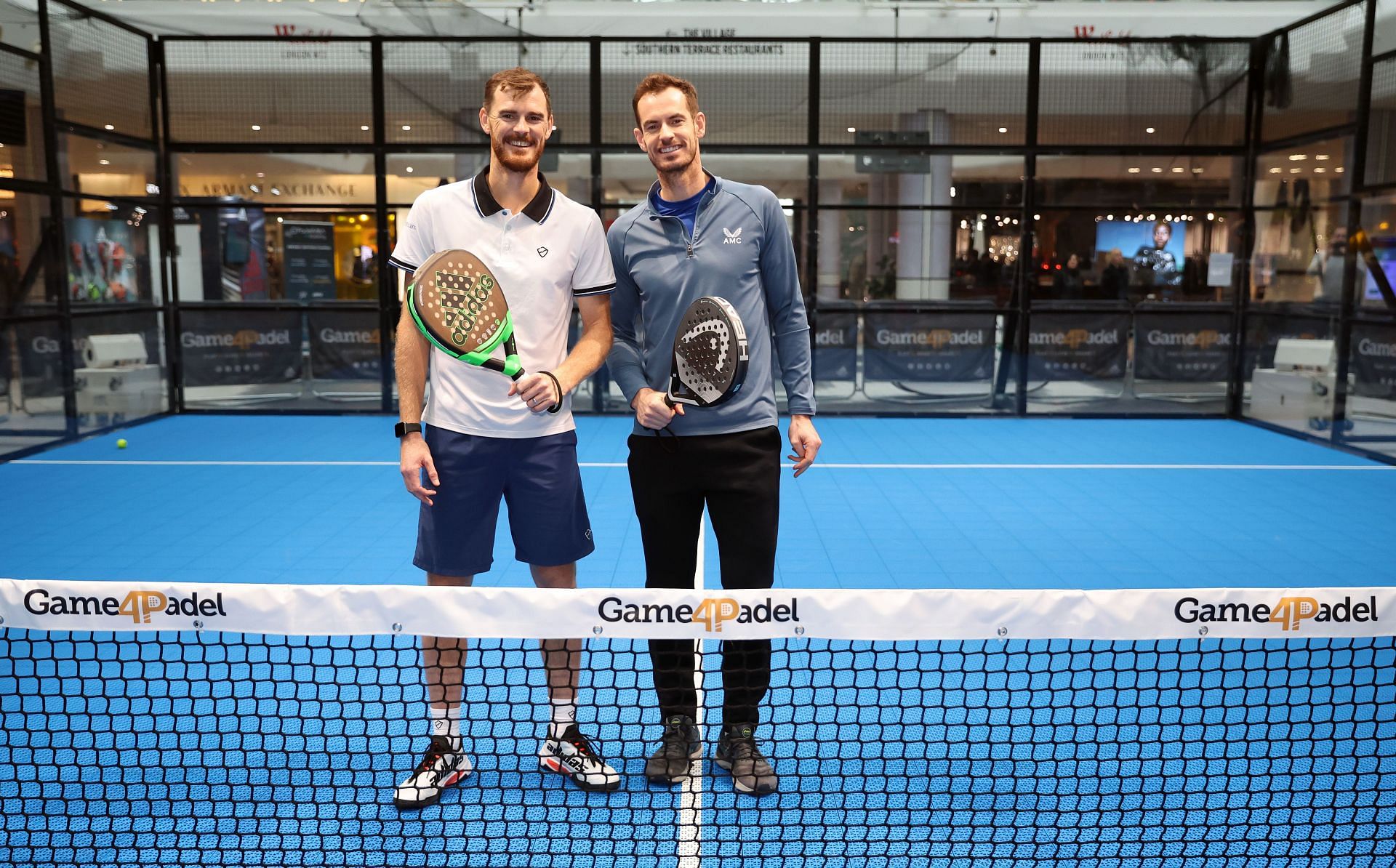 Jamie Murray (L) and brother Andy Murray at the Game4Padel pop-up event