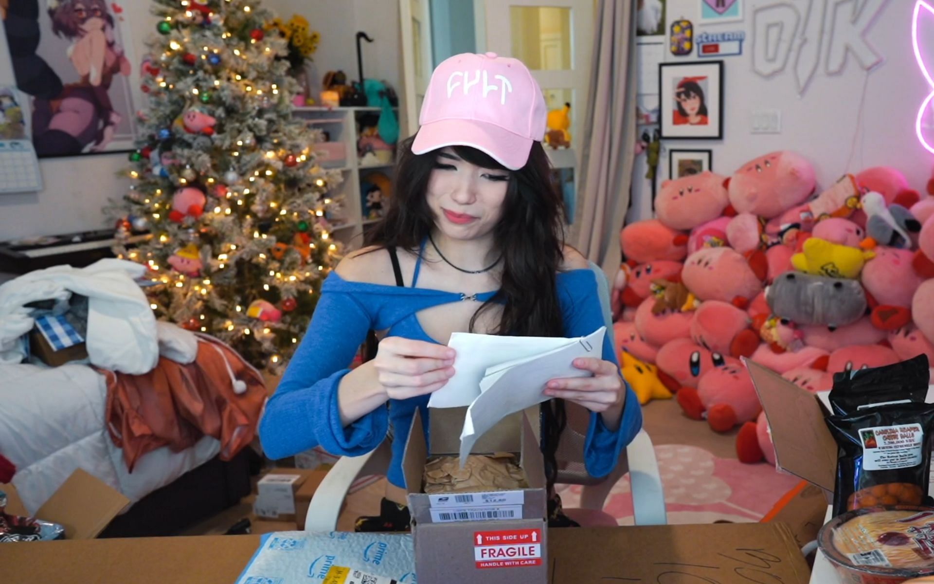 Emiru was rendered speechless after unboxing a questionable item during the PO Box opening stream (Image via Emiru/Twitch)