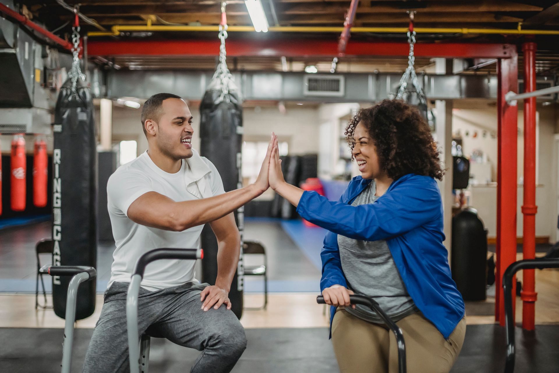 Exercise bike benefits are sure to persuade you into buying one. (Image via Pexels/ Julia Larson)