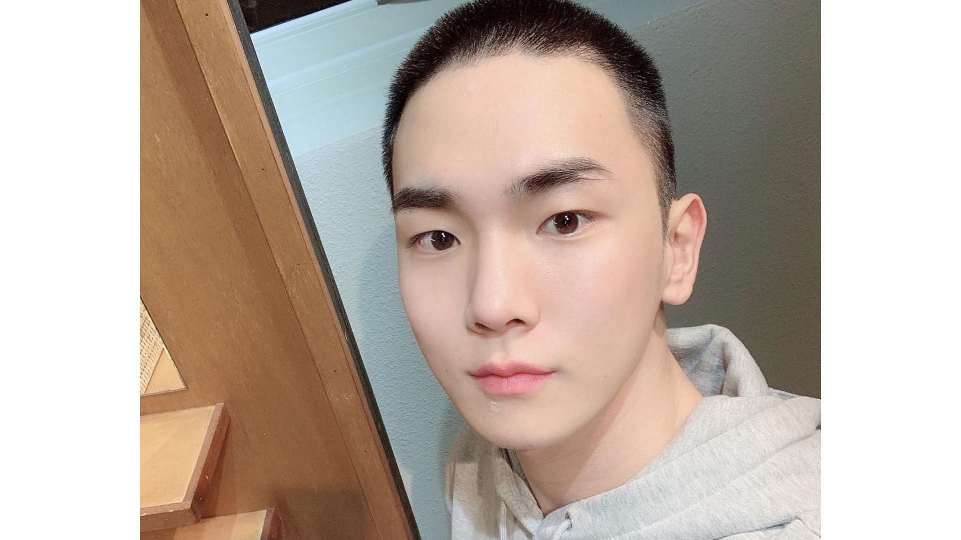 Kim Ki-bum a.k.a Key shared his buzzcut image ahead of his enlistment on 4 March, 2019 and was released during COVID at October 7, 2020. (Image via Instagram/@bumkeyk)