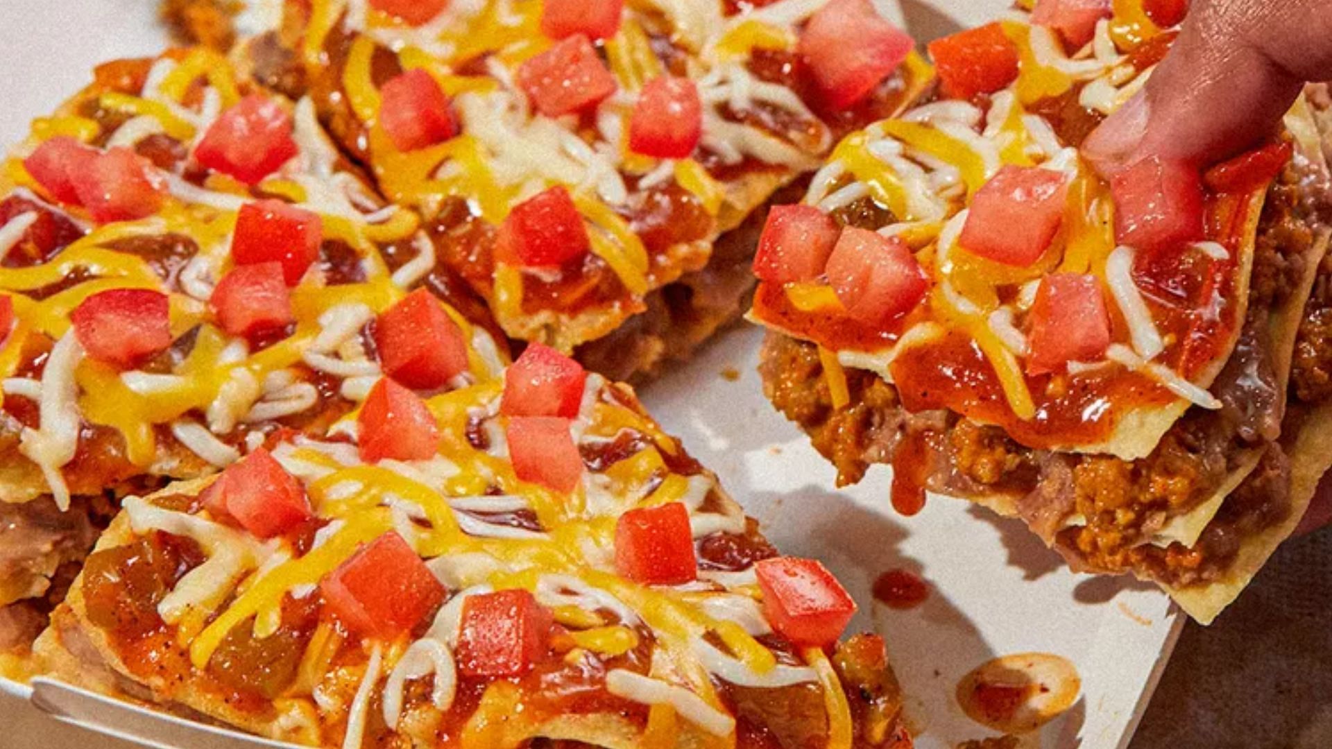Omaha customers can enjoy a new Triple Crunch Mexican Pizza (image via Taco Bell)