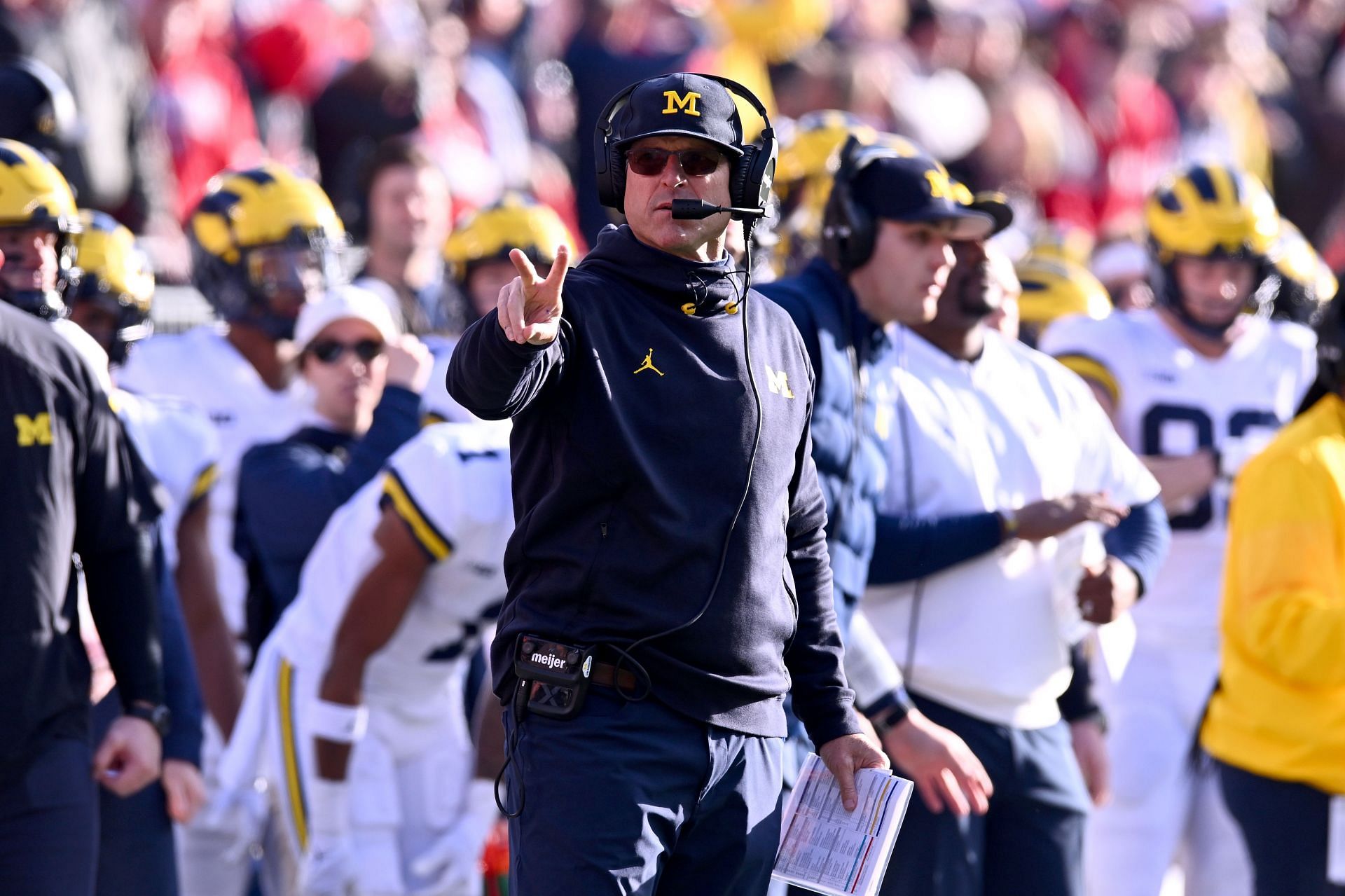 Amid latest NFL buzz, Michigan's Jim Harbaugh vows to be back in 2023