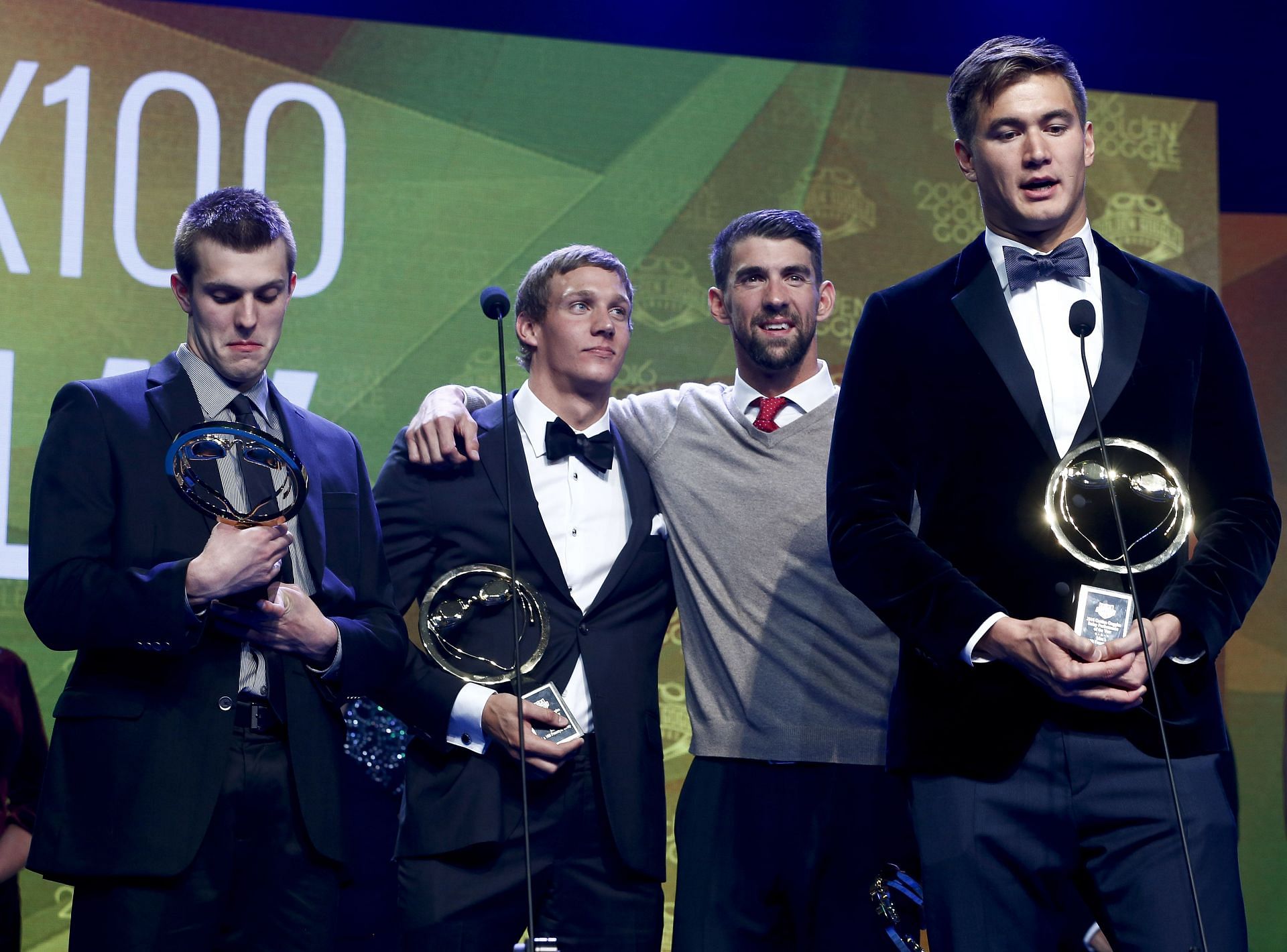Dressel and Phelps with the USA relay team at the 2016 Golden Goggle Awards (Photo by Jeff Zelevansky/Getty Images)