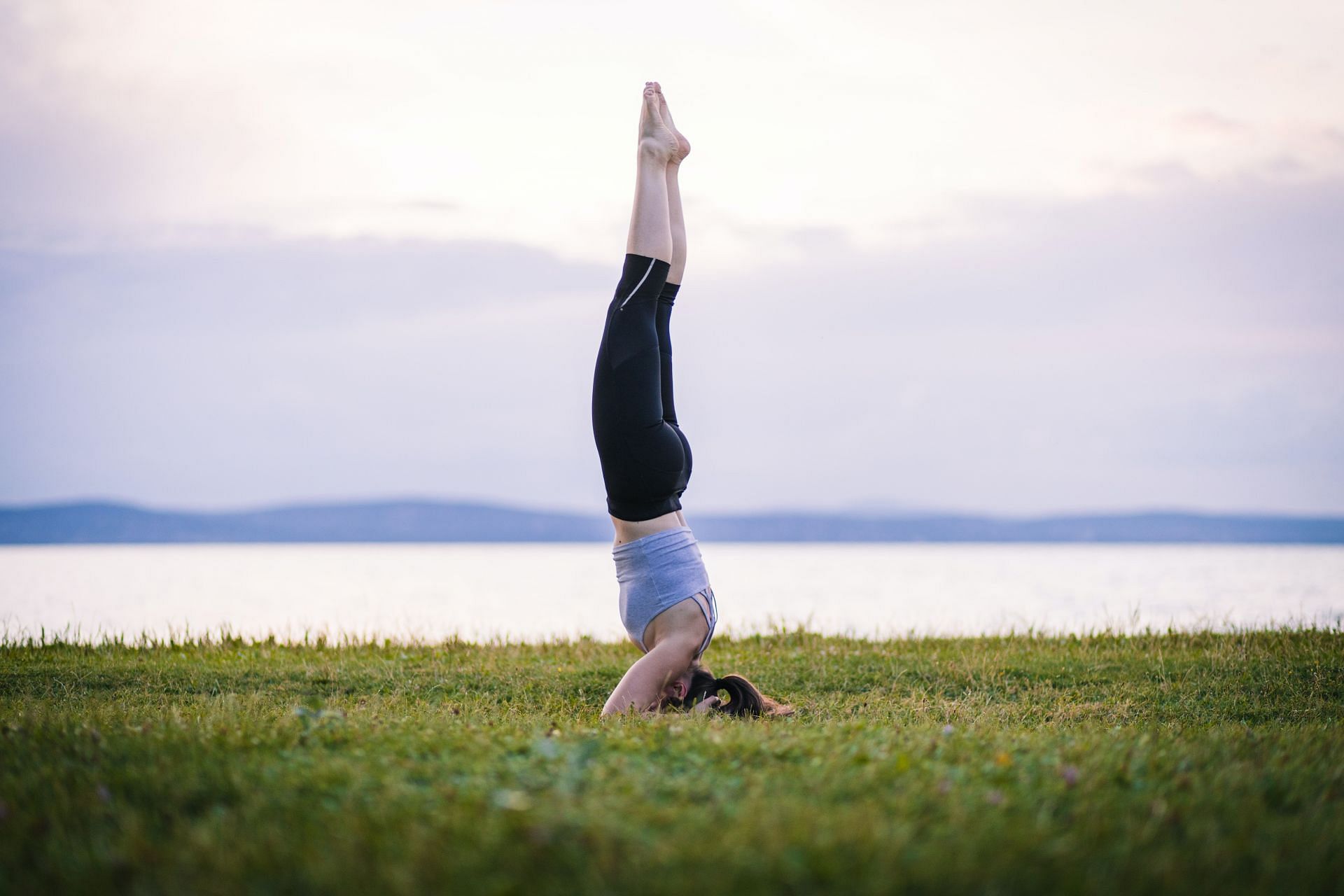 Here are the best yoga poses for thick and healthy hair! (Image via Unsplash/ Adel Grober)