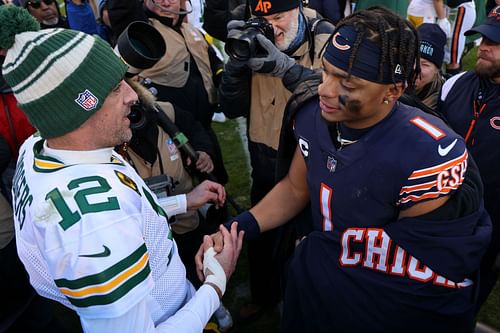 Aaron Rodgers and Justin Fields after Sunday's game