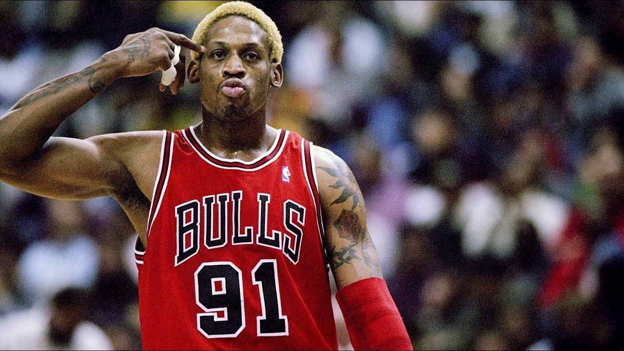 Dennis Rodman of the Chicago Bulls grabs a rebound in Game One of