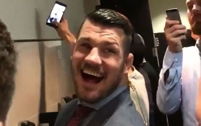 Michael Bisping reminisces getting mobbed by fans in the bathroom at UFC 205