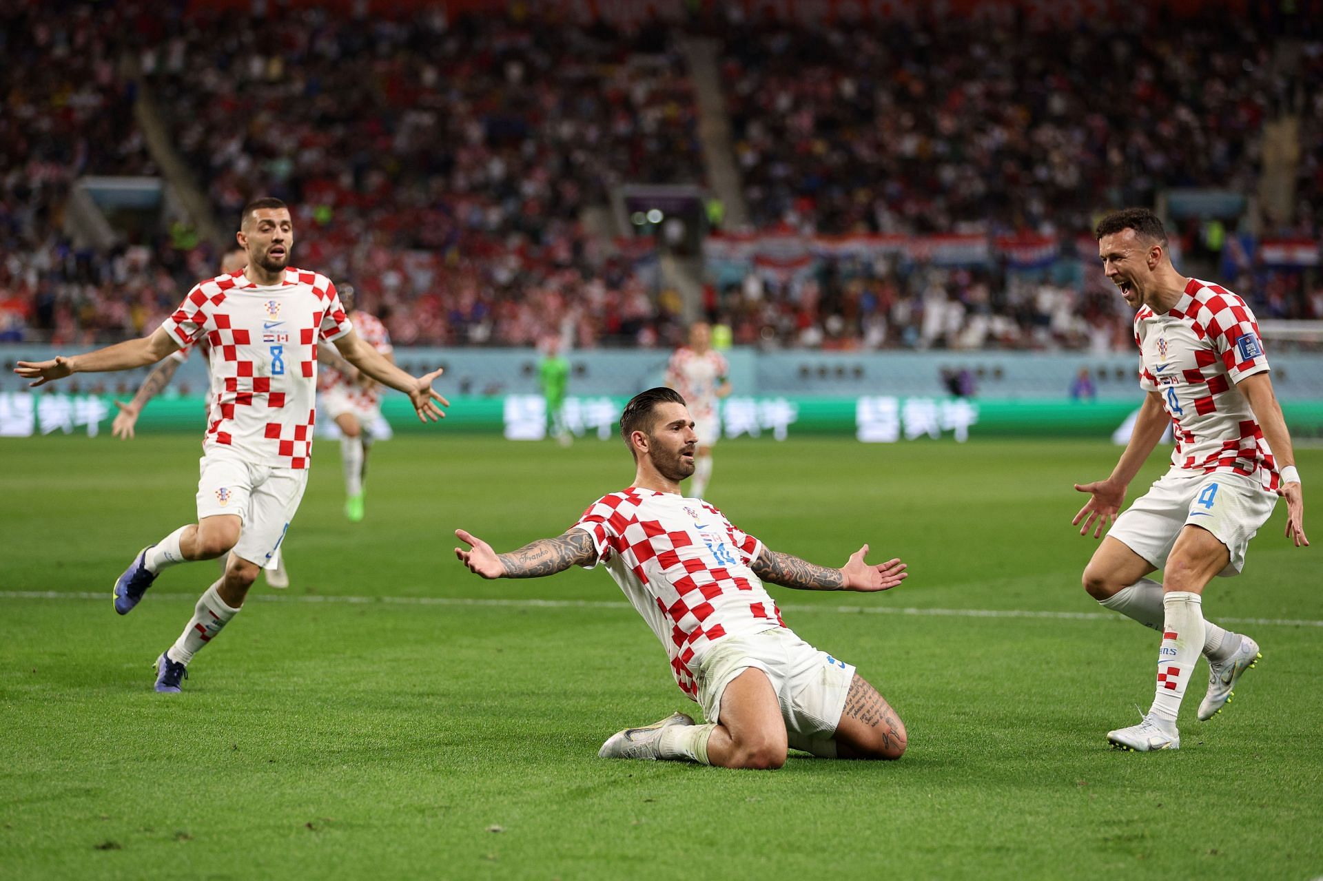 Marko Livaja celebrates scoring v Canada during a Group F game at the FIFA World Cup 2022 in Qatar